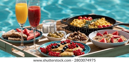 An inviting brunch spread featuring colorful dishes and refreshing drinks, perfect for a relaxing day by the pool.