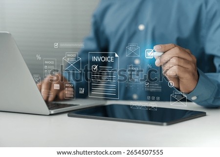 Invoice concept. Digital invoice processing and checklist financial workflow, electronic statements tax accounting solutions. Businessman using laptop to managing payment.