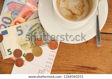 an invoice with an empty cup