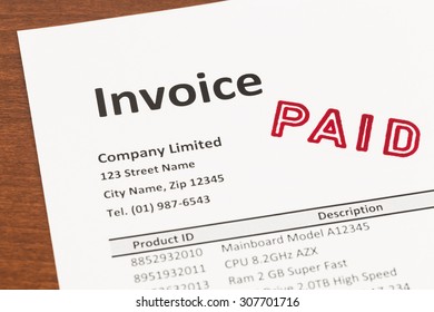 Invoice With Paid Stamp; Invoice Is Mock-up