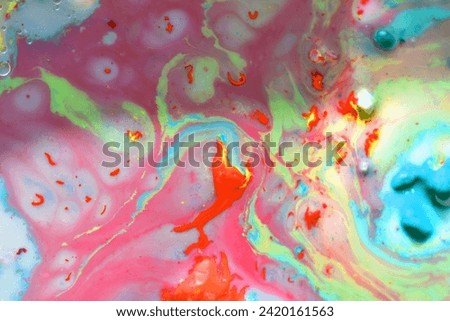 An involuntary drawing created using paint diluted in a liquid of several colors.