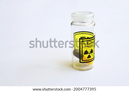 Iodine 131 (I-131), a radioactive isotope used to treat the thyroid gland, is stored in a capsule inside the vial.