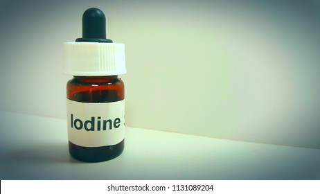 Iodine Bottle On Shelf With Faded Border