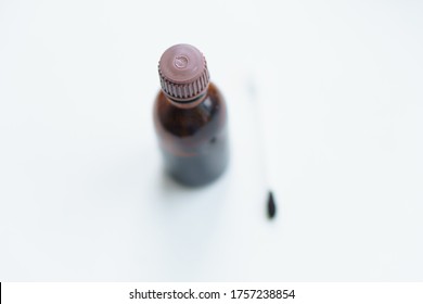 Iodine Jar And Ear Stick On The Windowsill. Medicine For Dermatic Diseases, Contagious Mollusks. Bank With Medicines. Medicine, Dermatology, Treatment Concepts. Copy Space. Soft Focus