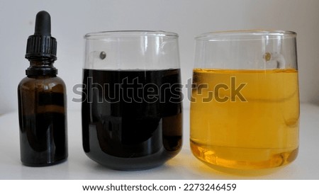 Iodine starch test in water. Water containing starch is turning color to black.The iodine-starch test is a chemical reaction that used to test for the presence of starch. 