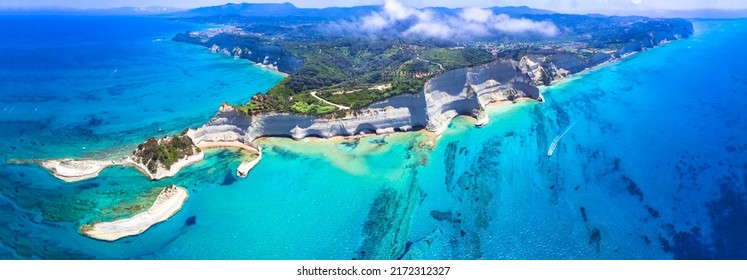 Ionian islands of Greece. Panoramic aerial view of stunning Cape Drastis - natural beuty landscape with white rocks and turquoise waters, northern part of Corfu island.  - Powered by Shutterstock