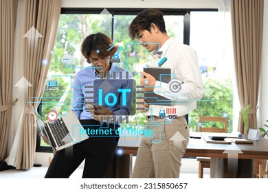 IOT developers with iot or internet of things to enable connected electronic devices and can be controlled remotely and connection icon in background.