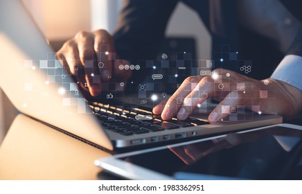 IoT, Internet of Things, digital marketing, online business, e-commerce, paperless office concept. Business man working on laptop computer with technology icons and global network on virtual screen