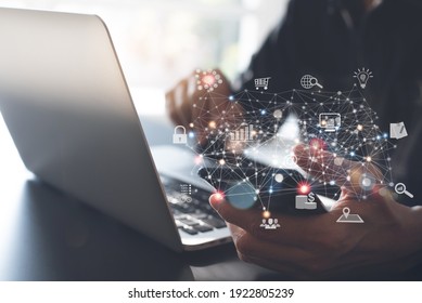 IoT, Internet of Things, digital software technology, metaverse, Ai Artificial Intelligence, data transfer, cloud computing and digital marketing concept. Man using smartphone and laptop computer