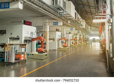 Iot Smart Industry 4.0 Concept. Automation Robotic Arm Working In Operation Machine Zone In Factory, Robot Using In Industrial Manufacturing For Precision, Repetition, Intense Labor,more Productivity