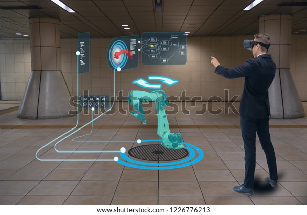 iot smart technology futuristic in industry 4.0\
concept, engineer use augmented mixed virtual reality to education\
and training, repairs and maintenance, sales, product and site\
design, and more.