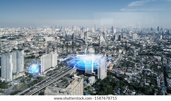IoT(Internet of\
Things) smart city futuristic technology and Mobility as a Service\
concept. aerial view urban road. Communication network. Autonomous\
car technology of\
future.