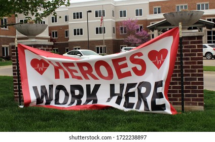 Iowa City, Iowa - May 4th 2020: A Heroes Work Here Sign Outside A Retirement Home