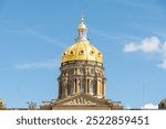 The Iowa state Capitol building on a hot late summer day with bl