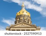 The Iowa state Capitol building on a hot late summer day with blue  skies.  Des Moines, Iowa, USA.