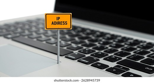 An IP Adress sign marks the portal to our online self on a laptop keyboard. Symbolizing connectivity and digital identity in sharp focus.
