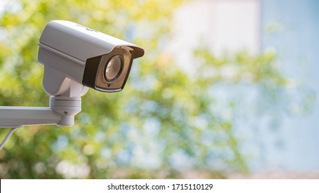 IP CCTV camera install by have water proof cover to protect camera with home security system concept. - Shutterstock ID 1715110129