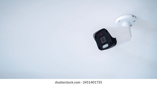 IP CCTV camera on white background with home security system concept.