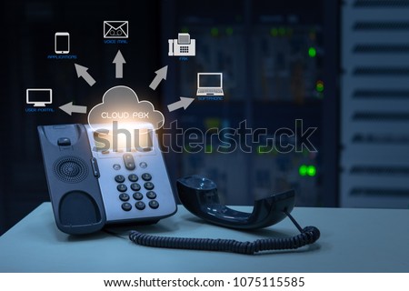 IP Telephony cloud pbx concept, telephone device with illustration icon of voip services and networking data center on background
