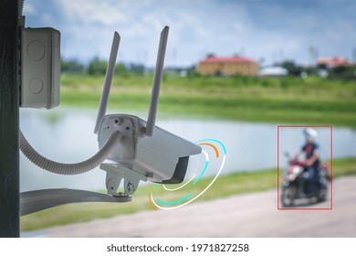 IP Wifi CCTV Infrared Camera For Checking Speed Of Cars On Street And Check For Safe Accident On Street Are Red Box Signal Of Speed Motion Check By CCTV System.