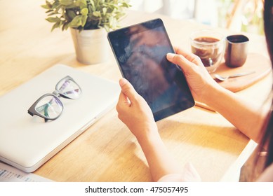 Ipad Holding By Working Woman Person. Lifestyle With Modern Woman Using Tablet Or Ipad With Hand Holding Touchscreen. Hands Of Working Woman With Smart Tablet Reading Online Website . Business Concept