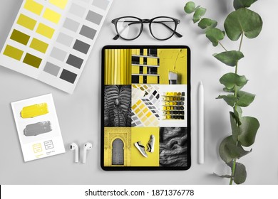 iPad pro on the table on screen Collage Illuminating and Ultimate gray Pantone color of the year 2021