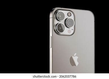 iPhone 13 pro max on a black background. three close-up phone cameras, apple logo. russia, krasnoyarsk 13 october 2021.