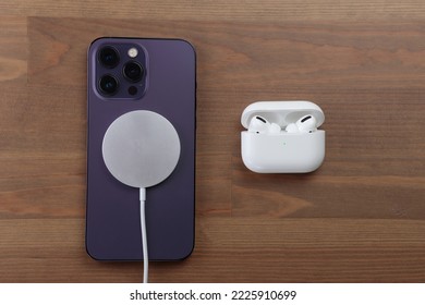 iphone 14 pro max, airpods pro, magsafe charger.