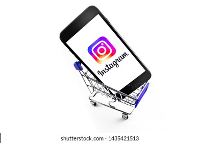 IPhone With Instagram Logo In Shopping Cart. Social Media. Instagram Is A Photo-sharing App For Smartphones. Moscow, Russia - June 25, 2019