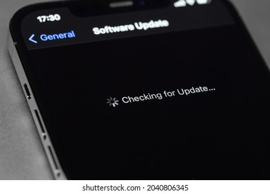 IPhone With Settings, IOS Update On Screen, Checking For Update. Apple Is A Multinational Technology Company. Moscow, Russia -  September 5, 2021