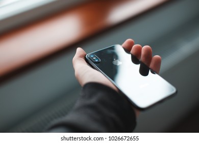 Iphone X in the hand, New York, USA - 16 February  2018 - Shutterstock ID 1026672655