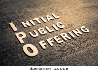 IPO abbreviation of Initial Public Offering text by wood letters