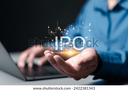 IPO, Initial public offering concept. Businessman use laptop with virtual IPO word with stock graph for boosting the growth by IPO process. 