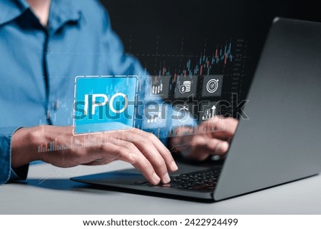 IPO, Initial public offering concept. Businessman use laptop with virtual IPO word with stock graph for boosting the growth by IPO process. 