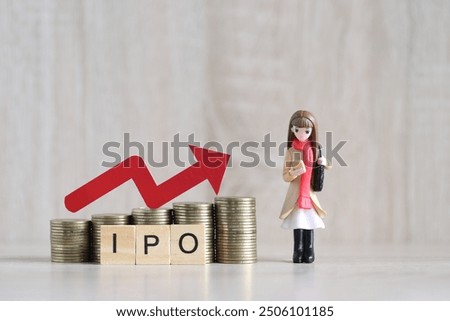 IPO ( Initial Public Offering), Red arrow on coins money and ipo word on wooden background, investment and business concept