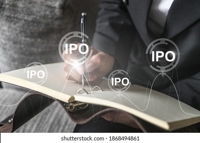IPO symbol hologram and a woman taking notes. Initial primary offering concept. Multiexposure.