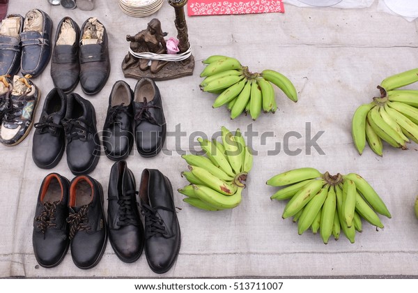 Ipoh, Malaysia\
- 2 November 2016 : pre-loved shoes and bananas on sale at Ipoh\'s\
Loken Market or Ipoh Memory Lane. \
