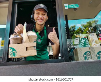 Ipoh, Perak, Malaysia - January 15, 2020 : Starbucks Worker Give Beveage At Drive Thru. 