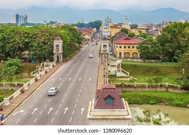 Ipoh, Perak, Malaysia - July 27, 2018: Overhead Time Lapse Of Cars Moving Traffic In Busy Day, Vehicles, Pedestrian On Conjunction Road At Ipoh Town.