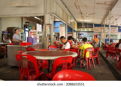 Ipoh, Perak, Malaysia - November 2012: A Crowded Food Court And Hawker Center Serving Local Food In The Town Of Ipoh In Malaysia.