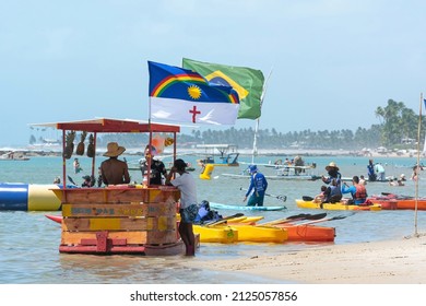 Ipojuca, PE, Brazil - October 15, 2021: Floating Bar And Aquatic Sports At Muro Alto Beach, A Paradise Famous Beach Of Porto De Galinhas With Warm And Calm Water Surrounded By A Reef Wall.