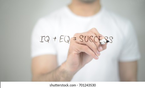 IQ + EQ = Success, Man Writing On Transparent Screen