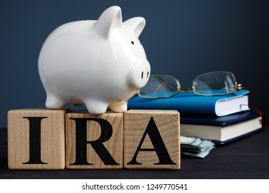 IRA Individual Retirement Account Written On Wooden Cubes.