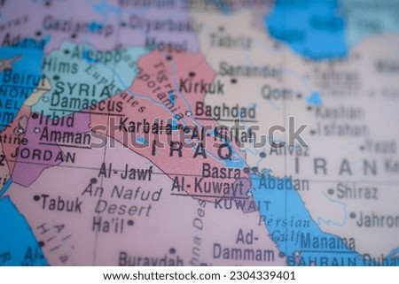 Iraq on political map of globe, travel concept, selective focus, background