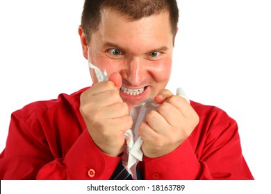 Irate man in red shirt rips sheet of paper