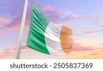 Ireland national flag blowing with mast. The flag waving in beautiful sky. Ireland national flag for independence day.