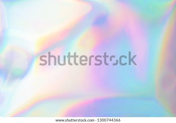 Iridescent background. Holographic Abstract\
soft pastel colors backdrop. Holographic Foil Backdrop. Trendy\
creative gradient.