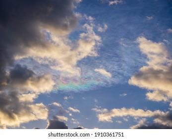 Iridescent Clouds That Appeared Under The Blue Sky