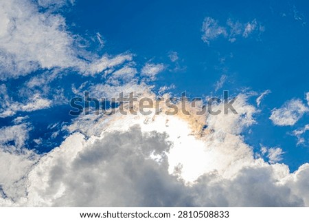 Iridescent cloudscape exhibiting diffraction, cirrus sunlight cumulus