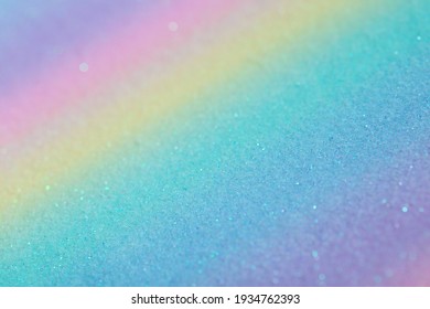 Iridescent Rainbow Background With Glitter. Gradient Texture With Fine Sparkles, Macro Photography